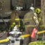 Firefighters investigate the explosion site at the school in Bangkok