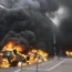 Cars burn after a march for Nahel in Nanterre