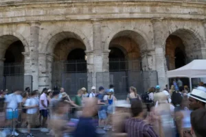 Man filmed carving name on Colosseum is tourist living in Britain, police say