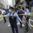 Police attended the explosion at a building in Tokyo’s commercial district of Shimbashi