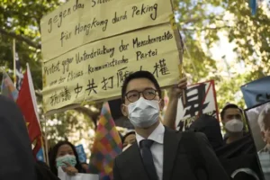 Hong Kong leader says eight pro-democracy activists ‘will be pursued for life’