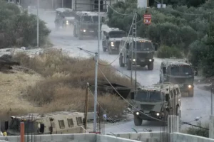 Israeli troops begin leaving Jenin camp as heavy fighting continues