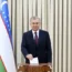 Uzbekistan’s president Shavkat Mirziyoyev casts his ballot at a polling station