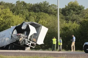 Three killed as Greyhound bus crashes into parked lorries in Illinois