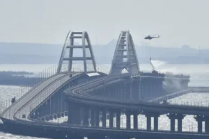 Deaths, explosions reported as key bridge from Crimea to mainland Russia closed