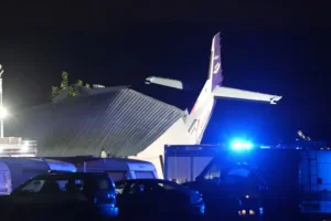 Five killed as small plane crashes into hangar during bad weather in Poland