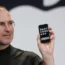 Apple chief executive Steve Jobs holding an Apple iPhone at the MacWorld Conference in January 2007 in San Francisco