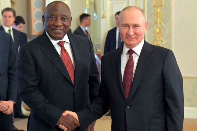 Russian president Vladimir Putin, right, and South African president Cyril Ramaphosa