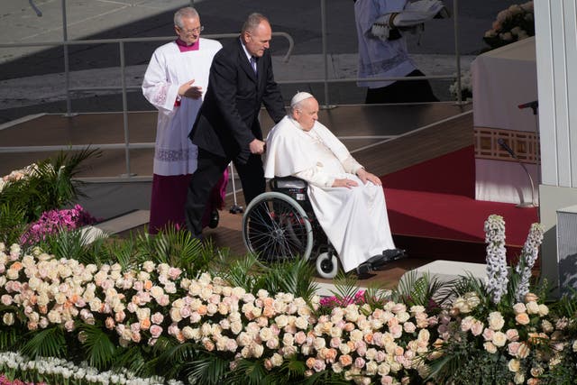 65b84ab3fa524bfebdef81aa8aaaef03 Pope Francis arrives in a wheelchair in St Peter’s Square at the Vatican to celebrate the Easter Sunday Mass