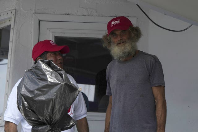 675b9e9ae19a4cce8e59adc54471a31b Australian Timothy Lyndsay Shaddock, right, stands next to a crew member of the Mexican tuna boat Maria Delia as they arrive in Manzanillo, Mexico