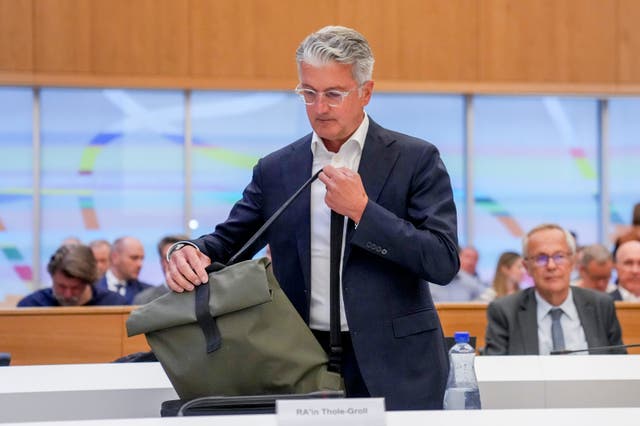 Rupert Stadler enters a regional courtroom(Matthias Schrader/AP)