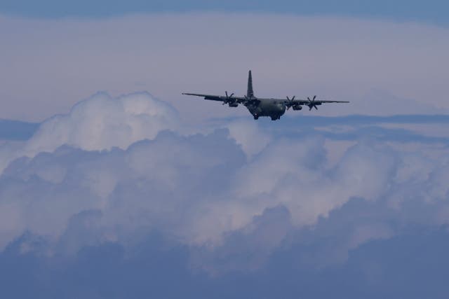 A British military transport aircraft prepares to land at Larnaca airport, Cyprus