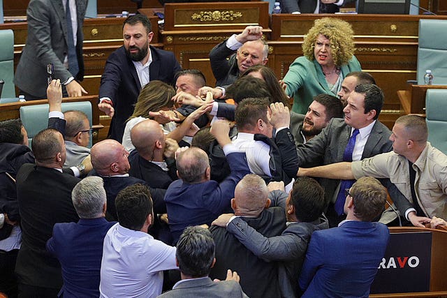 888b87ca2d964dcf9a4ec439d3b35b90 Legislators push each other as a brawl breaks out in Kosovo’s parliament in Pristina