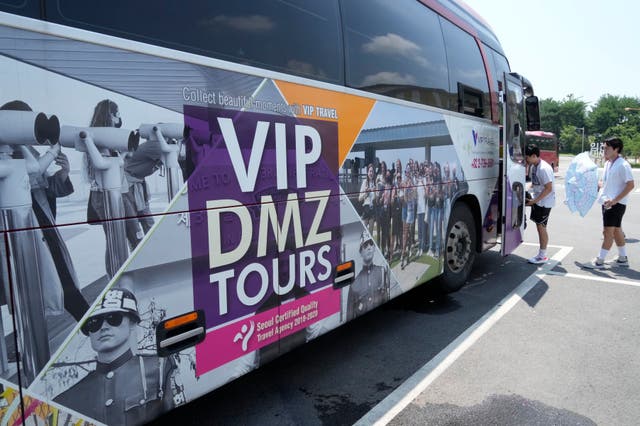 A bus advertising a DMZ tour in Paju, South Korea