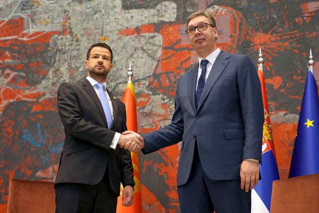 988ec91b8364444289974ea625ff5cb6 Montenegro’s President Jakov Milatovic with Serbian president Aleksandar Vucic shake hands