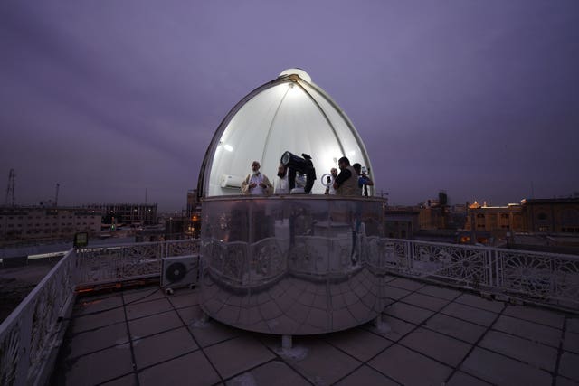 a5ef8d4fa0694aebaa1ade915cd44982 Shiites observe the crescent moon to determine the start of the tenth Islamic month of Shawwal, which marks the end of a month-long fasting of Ramadan and the beginning of the Eid al-Fitr festival in Najaf, Iraq, on Thursday