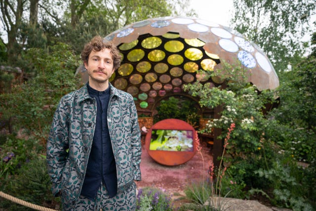 2-72296191 Designer Tom Massey outside the Royal Entomological Society Garden