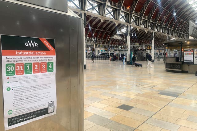 2-72432637-1 Strike signage in a quiet Paddington station in London