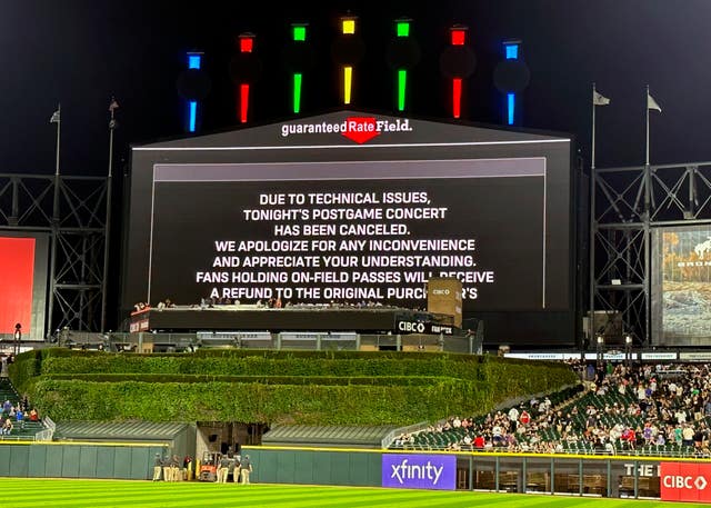 A sign announces a concert cancellation