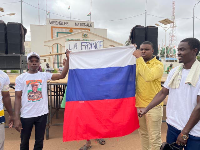 4a0132508a534125a7fb08fcb2c69b69 Supporters of Niger’s ruling junta hold a Russian flag at the start of a protest called to fight for the country’s freedom and push back against foreign interference in Niamey, Niger