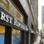 People walk past the headquarters of First Republic Bank in San Francisco