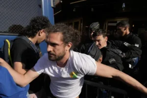 Climate protesters face tear gas at TotalEnergies shareholder meeting in Paris