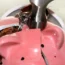 A piggy bank being smashed