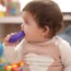 A child sucking on a toy