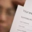 Woman reading energy bill
