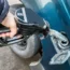 A driver fills up at a Tesco diesel pump