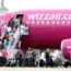 Passengers getting on a Wizz Air plane at Luton Airport