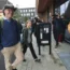 Climate activist Greta Thunberg, centre, arrives at court