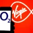 The Virgin Media logo with the O2 logo on a smartphone in the foreground