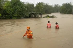 Typhoon rips off roofs, floods villages and displaces thousands in Philippines