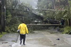 Typhoon leaves at least two dead and displaces thousands in northern Philippines