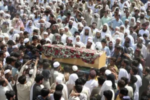 Funerals held after 54 die in bombing at election rally for pro-Taliban cleric