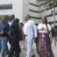 Lawyer Ben Crump, second from left, walks with Ron Lacks, left, Alfred Lacks Carter, third from left, both grandsons of Henrietta Lacks, and other members of her family