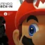 A person walks past an advertisement featuring a Nintendo character at Narita airport in Narita, near Tokyo