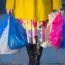 A woman carrying colourful shopping bags