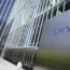 People walk past the headquarters of Sony in Tokyo