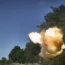 Ukrainian soldiers fire a self-propelled howitzer towards Russian positions at the front line in Donetsk