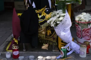 Funeral held for football fan killed in Athens attack