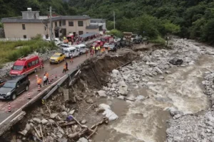 China residents evacuated from homes amid search for more mudslide victims
