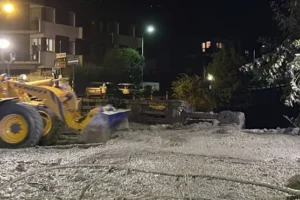 Crews clear streets after mudslide swamps town in Italian Alps