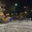 An excavator removes mud and debris