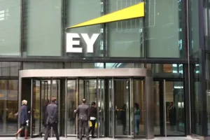EY to cut jobs and hand out smaller pay rises
