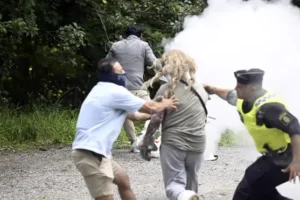 Woman sprays Koran-burning protester in Sweden with fire extinguisher