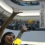 Protesters sing Glory To Hong Kong at a shopping centre