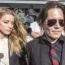 Amber Heard and Johnny Depp outside Southport Magistrates' Court in Queensland in 2016