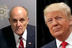 Rudy Giuliani hands himself in to police over claims he helped Donald Trump try to subvert 2020 US election